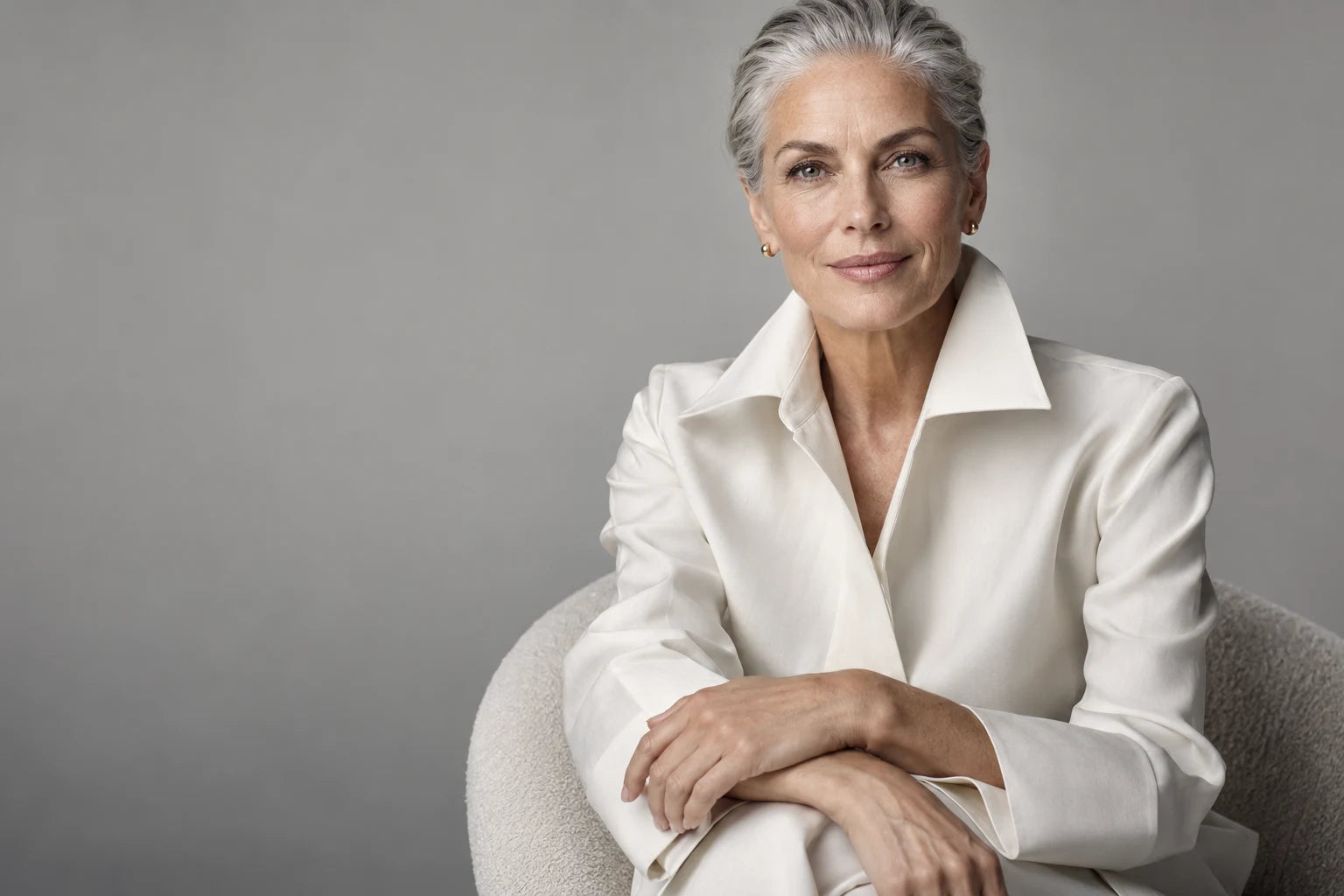 Studio portrait of a woman with silver hair